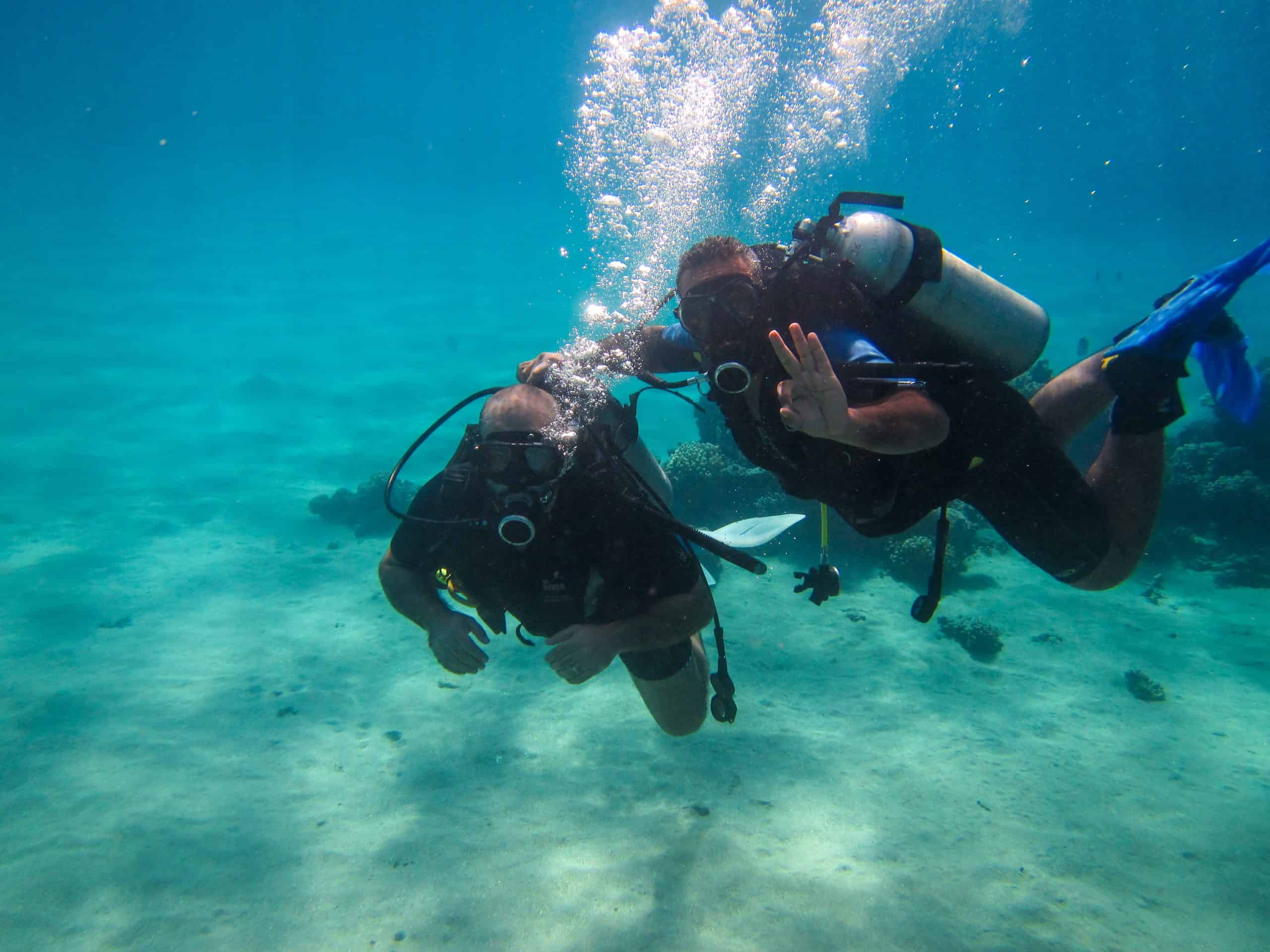 What should I consider when buying diving equipment?
